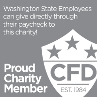 Grey and white badge for Washington State Employees Combined Fund Drive, reading “Proud Charity Member.”